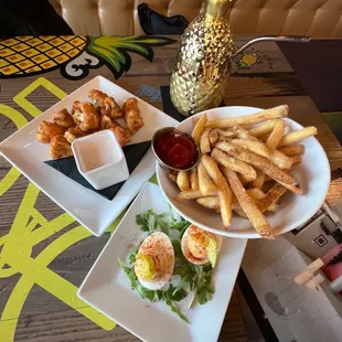 Buffalo cauliflower, deviled eggs, b+k fries