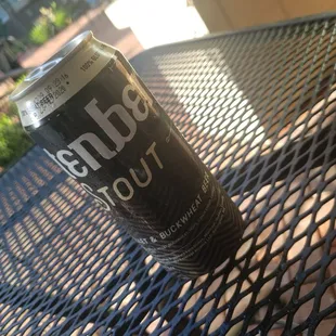 a can of soda on a table