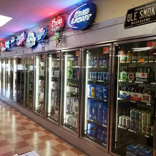 a row of coolers in a store