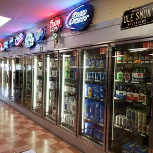 a row of coolers in a store