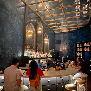 people sitting at the bar