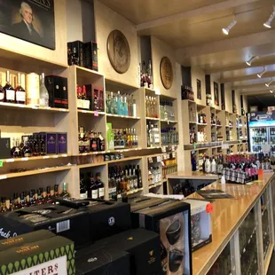 a liquor store with a variety of bottles