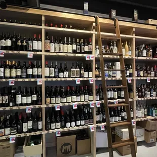 shelves of wine in a store