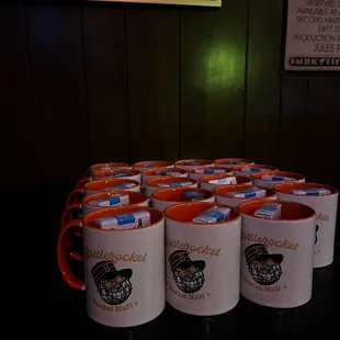 a row of coffee mugs
