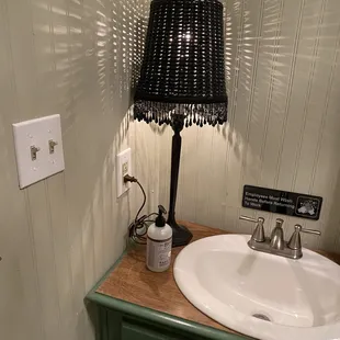 a sink and a lamp