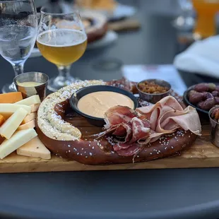 a platter of meats and cheeses
