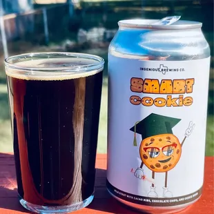 a glass and a can of beer