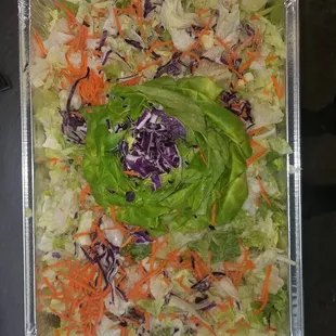 a salad in a plastic container