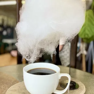 a steaming cup of coffee