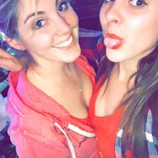 two girls posing for a picture