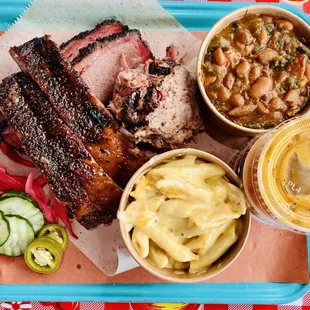3 plate meal with ribs, pulled pork, brisket, baked beans and mac n cheese.