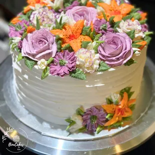 Designer's Choice...you pick the color palette and I design the cake. Roses, carnations and Tiger Lilies.