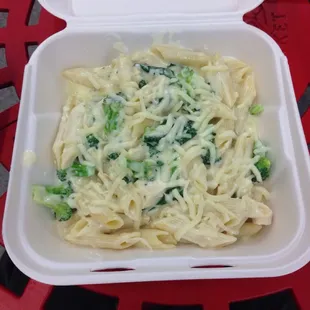 Angel Hair Pasta with Alfredo sauce, chicken, broccoli, spinach, garlic, etc.