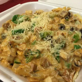 Fettucine with half alfredo/half marinara with sausage and chicken and pretty much every vegetable offered :)