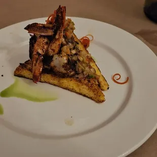 Blackened Shrimp &amp; Grit Cake with warm house made bacon vinaigrette