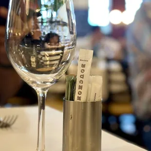 Bouchon Table with water glass  Photo by Anton N