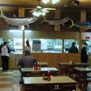 Inside, It seems to be as much an homage to the founder's hunting and fishing prowess as it is a serviceable Cajun eatery.