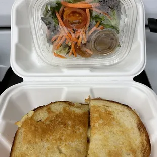 The Great grilled cheese with bacon and side salad.