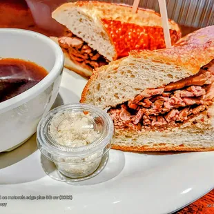 Classic French Dip Sandwich featuring the Boudin Bakery sourdough baguette. With au jus + side of horseradish.