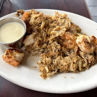 This is called bar trash. It&apos;s broiled, shrimp, lump crab meat, and a really nice lemon butter sauce tastes amazing.