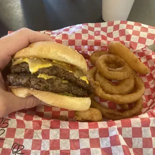 Double cheeseburger with onion rings.
