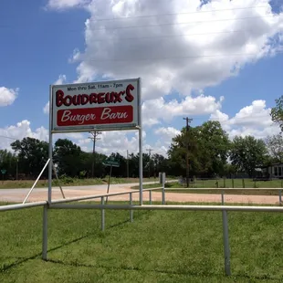 a sign for boudreux&apos;s burger barn