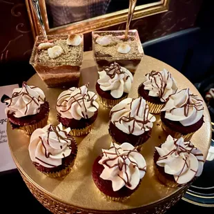 Red velvet cupcakes with a chocolate ganache drizzle and cream cheese frosting. And s&apos;mores trifles that are to die for!