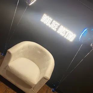 a chair and balloons
