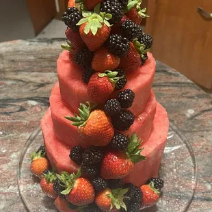 Bring a beautiful watermelon tower to the bbq,  It will be the star of the table