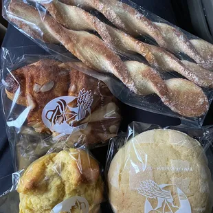 Butter sticks, almond croissant, corn bread, melon bread