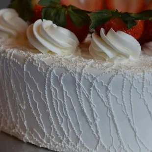 Strawberry whipped cream cake.  SCRUMPTIOUS and light.