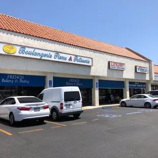 cars parked in front of the store