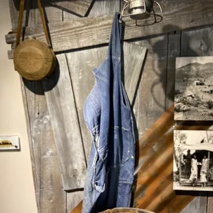 Clothing worn by some Boulder City Dam workers and a canteen to quinch their parched mouth.