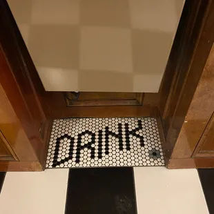 a black and white tile floor