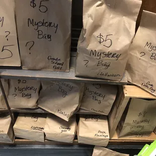 Mystery bags at different prices. And it has a hint on the bottom.