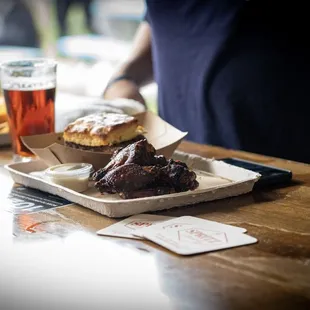 a tray of desserts and drinks