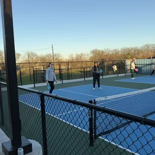 Pickleball courts, playground in the background