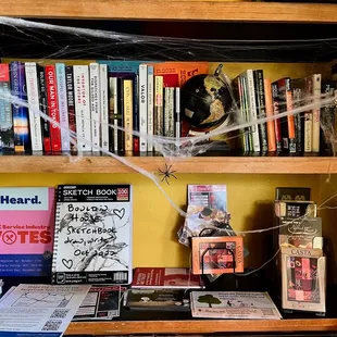 A bookshelf near the waiting area