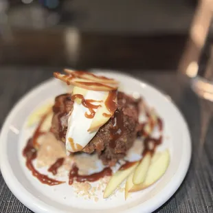 The world's best bread pudding with apple crisp and caramel sauce.