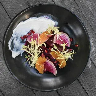 a plate of food on a wooden table