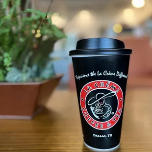 a cup of coffee on a table