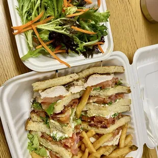 Mixed salad side and chicken club sandwich lunch