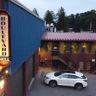 Drone capturing a sideview of our building during sunset!