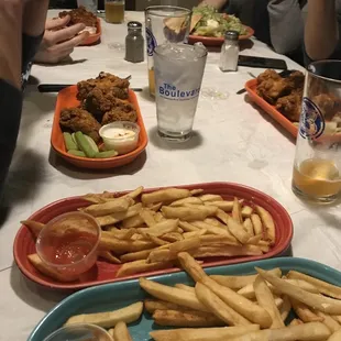a table full of food and drinks