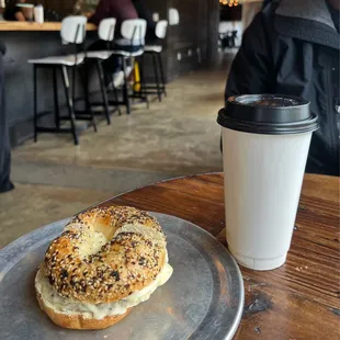 a bagel and a cup of coffee