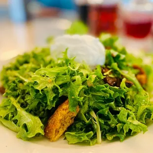 Frisée salad goes nicely with the Pink Champagne..