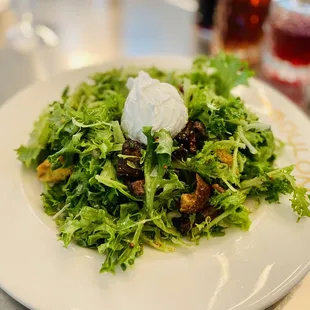 Frisée salad. Poached egg on top is optional..