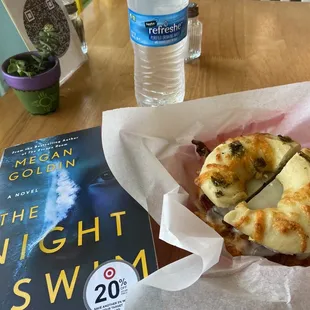 Sweetheart breakfast bagel w/ green chili bagel, sausage, bacon, and Swiss cheese.