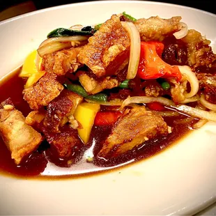 Crispy pork belly in basil garlic chili sauce with side of steamed jasmine rice rice (aka Kra Pow Moo Grob)