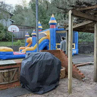 Bounce house set up in our backyard.